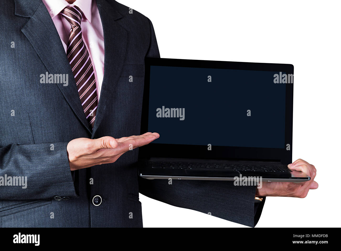 Portrait of a male executive presenting new laptop Close-Up Stock Photo