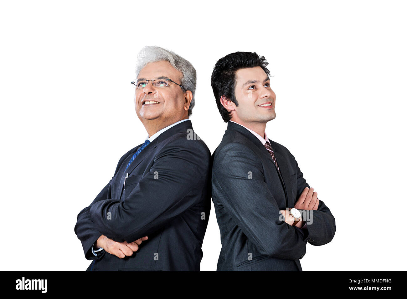Two Men Standing Back To Back Against A White Background Stock