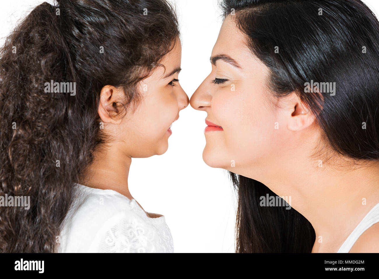 Happy Mother Touching Nose With Little Girl Loving Fun Enjoy