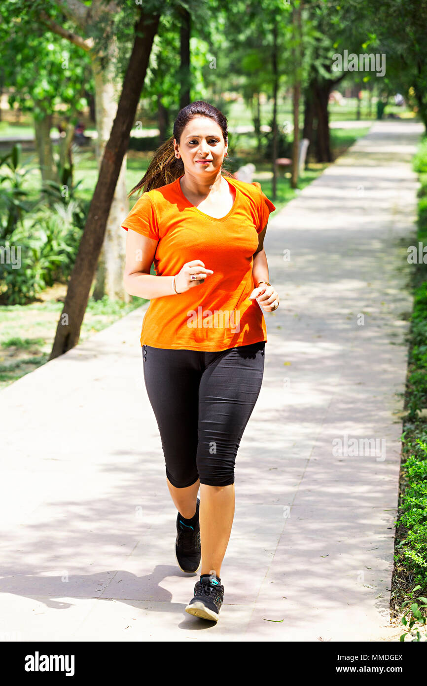 Woman running park 30 exercise hi-res stock photography and images - Alamy