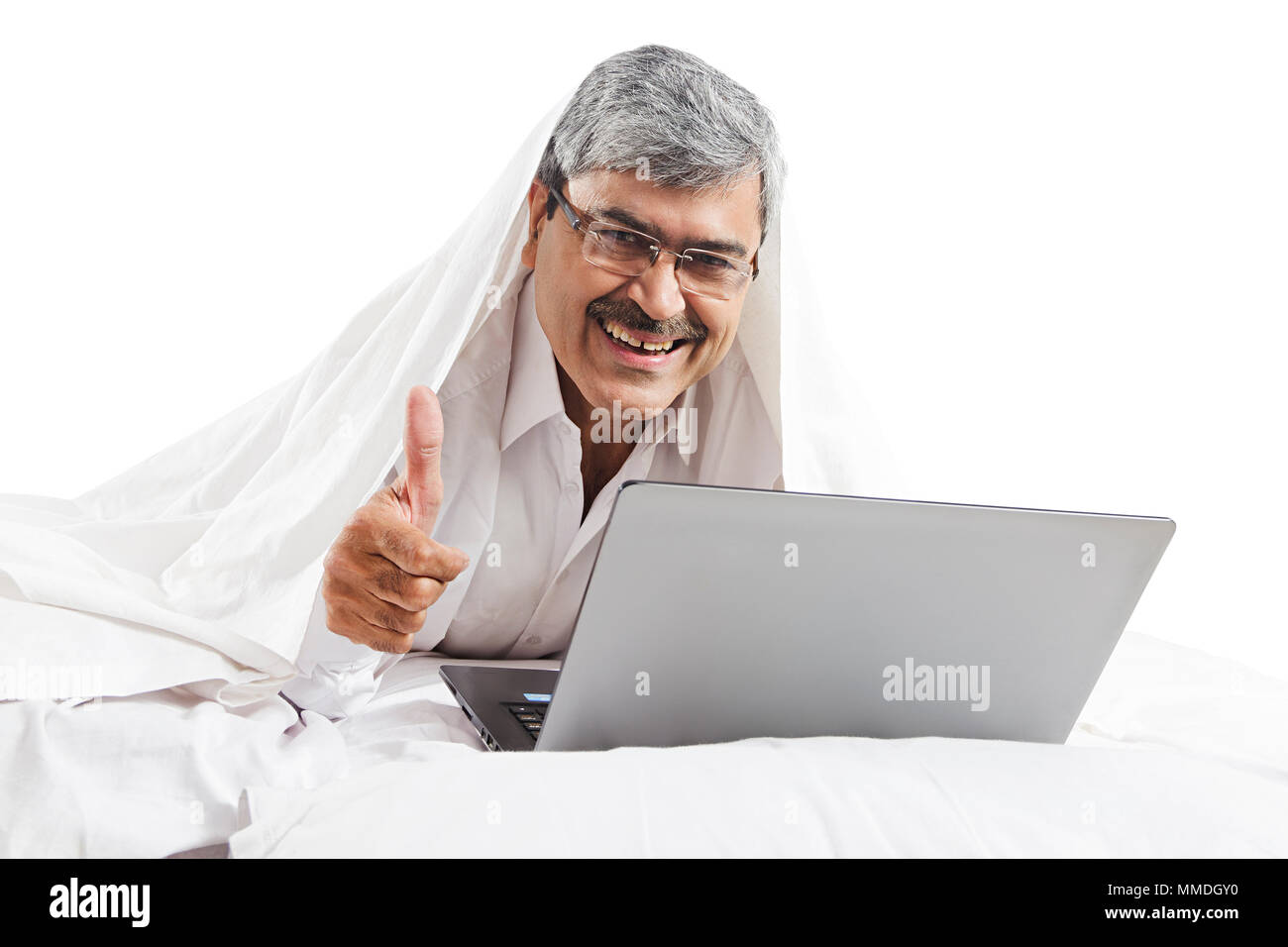 Happy Old Man Lying Bed Showing Thumbs-up Using Laptop Bedroom Stock Photo
