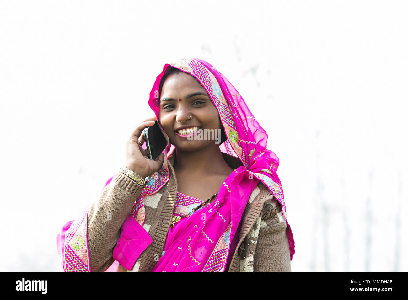 One Rural Woman Housewife Talking On Mobile Phone Outdoors Village Stock Photo