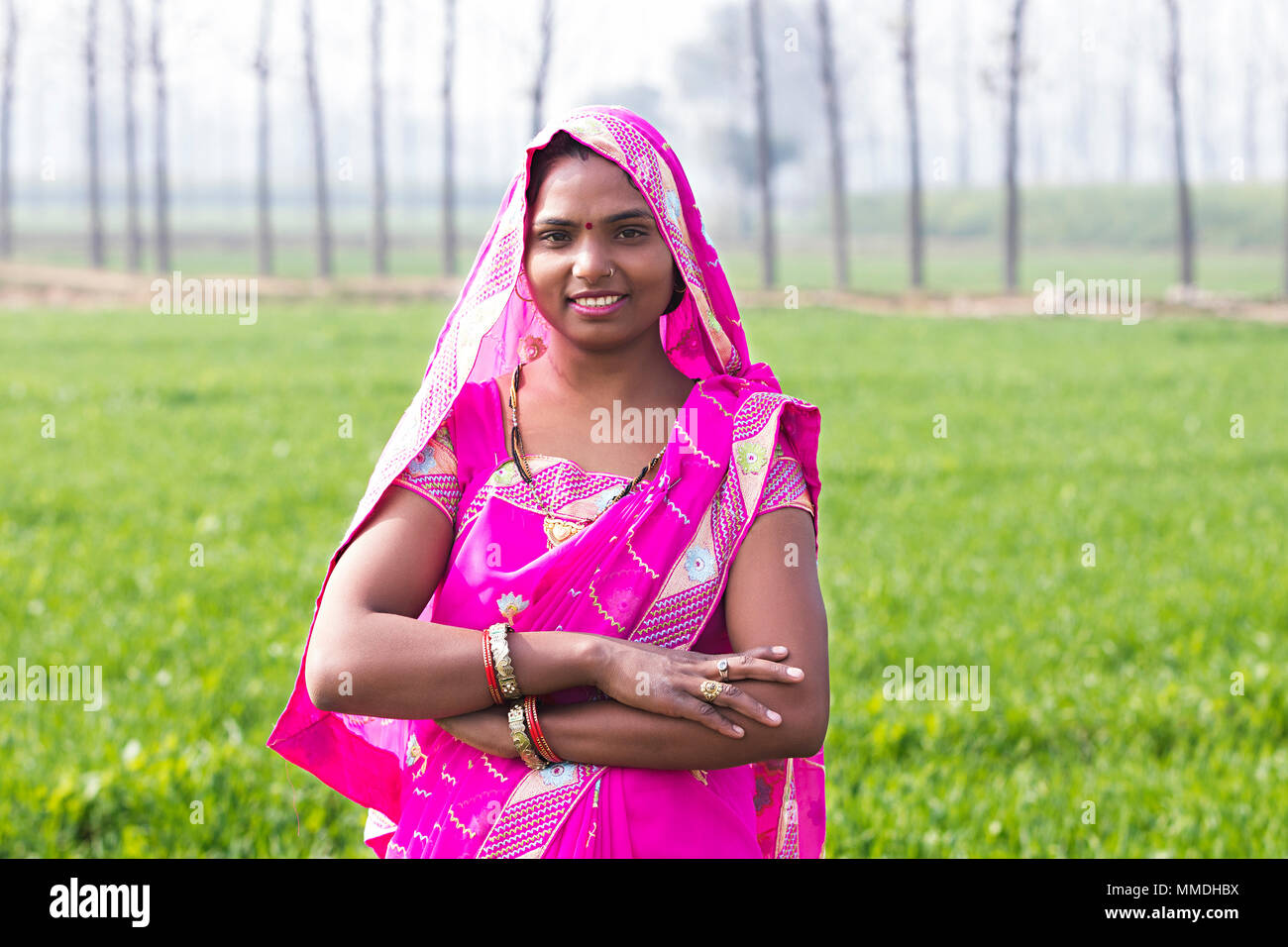 One Rural Farmer Female Crossed Arms Standing In Farm Village Stock ...