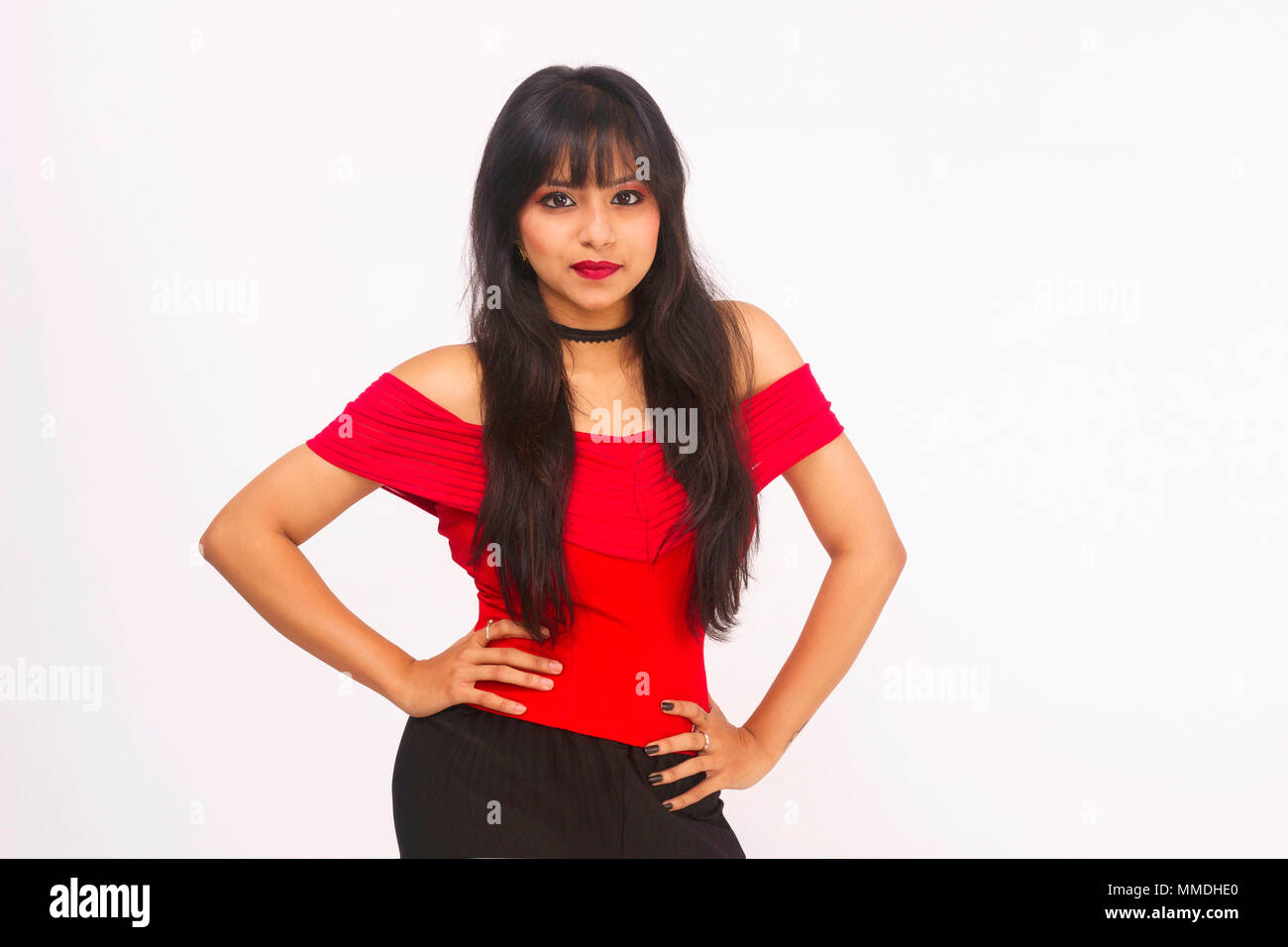 Stylish Woman In Red Top With Arms On Waist Looking At Camera Front Pose Stock Photo Alamy Stylish Woman In Red Top With Arms On Waist Looking At Camera Front Pose Stock Photo Alamy