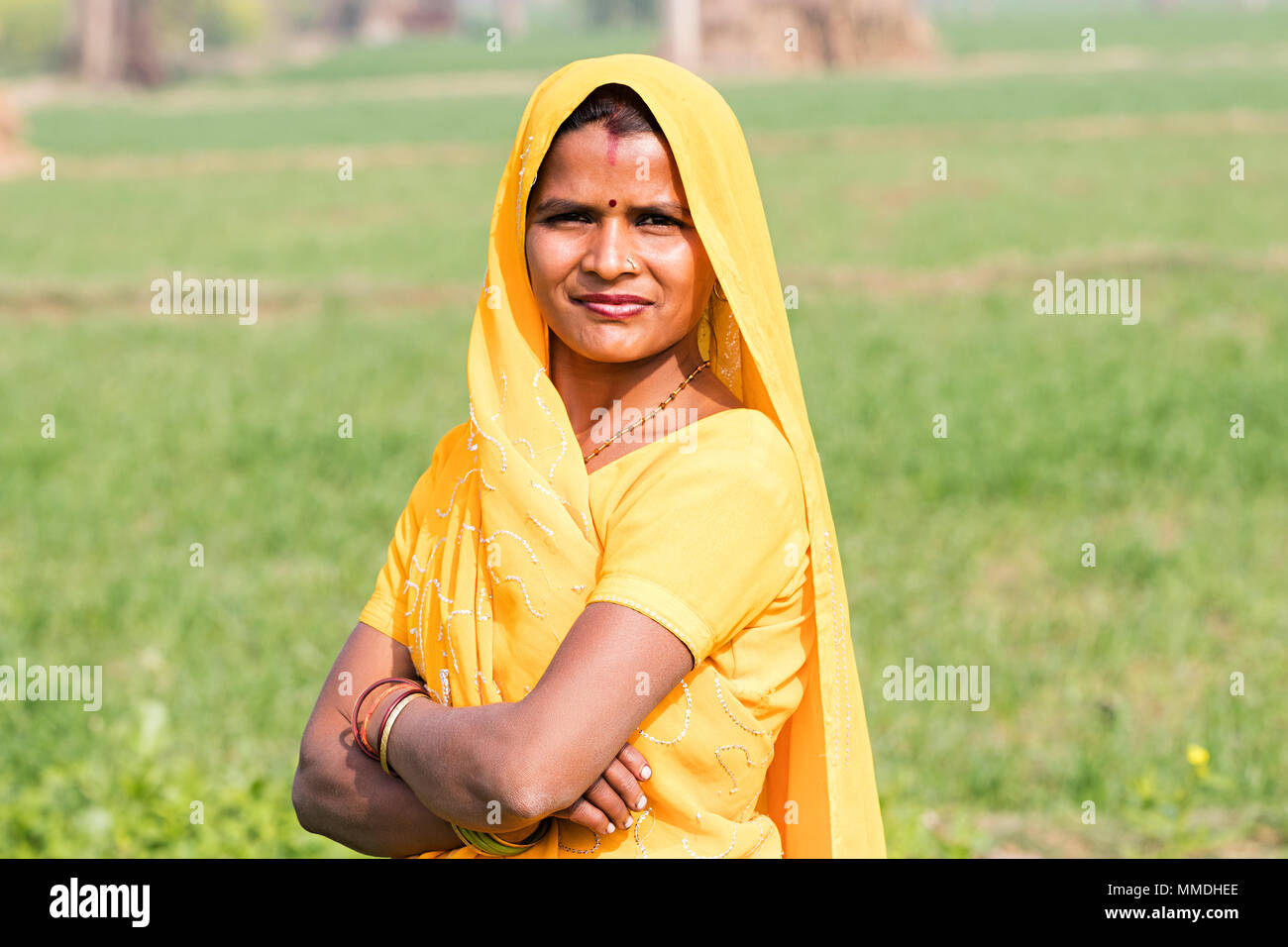 One Rural Farmer Female Crossed Arms Standing In-Farm Village Stock ...