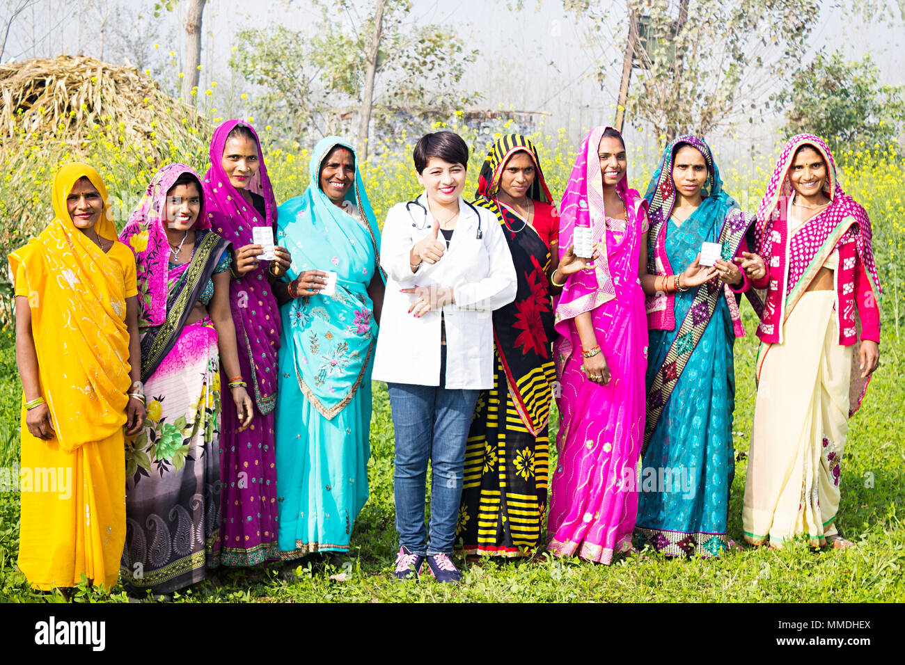 Group Villager Ladies And Doctor Treatment Showing Medicine Thumbs-up Farm Village Stock Photo