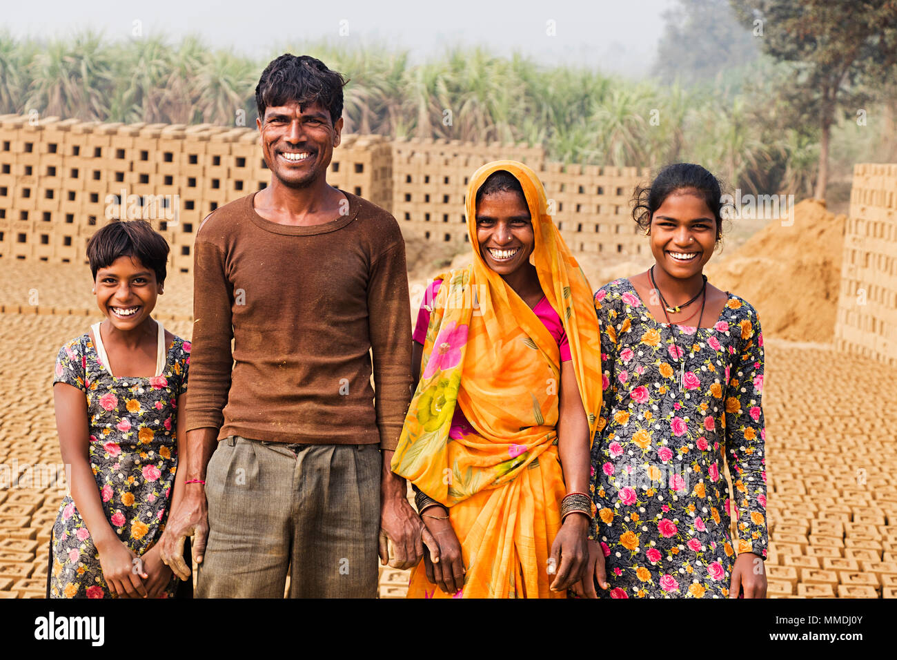 Factory Labour Family, Parents And Kids Together Village Brick Factory Stock Photo