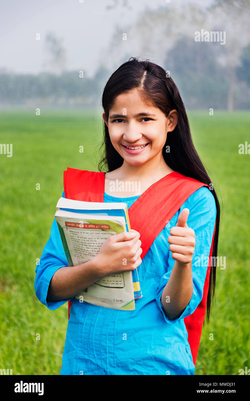 Rural Villager College Girl Student Showing Thumbs-up With Books Farm Stock Photo