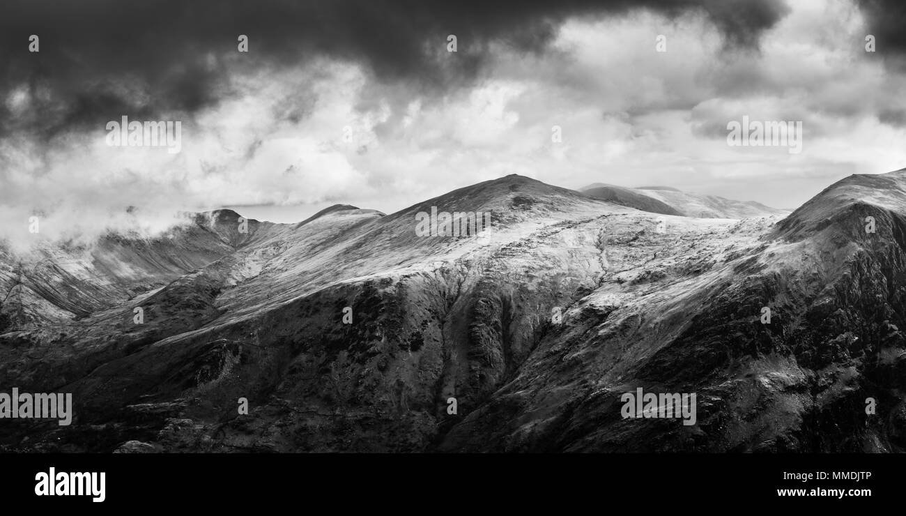 Panoramic view of Glyder Fawr from Mount Snowdon in black and white Stock Photo