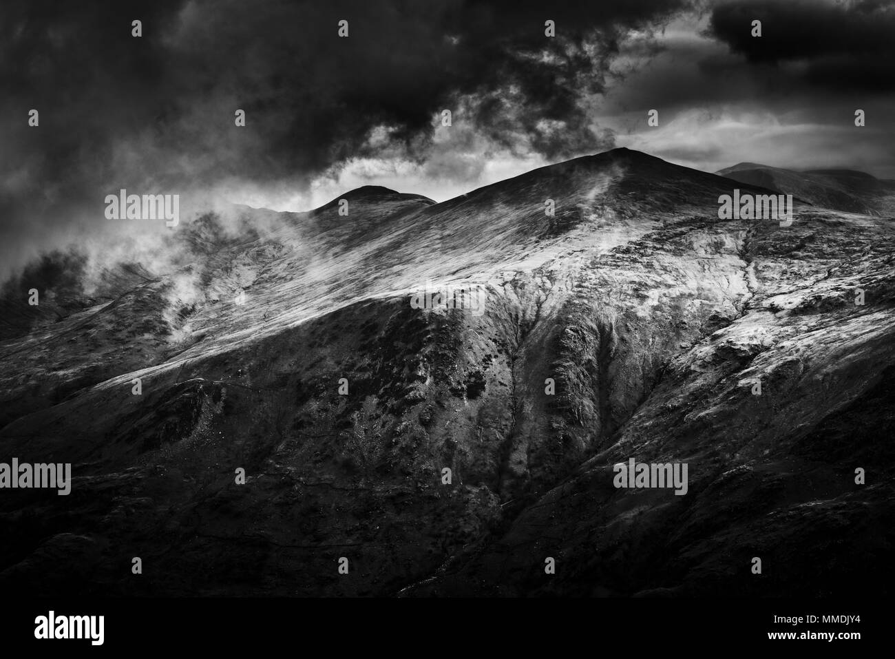 View of Glyder Fawr from Mount Snowdon in black and white Stock Photo