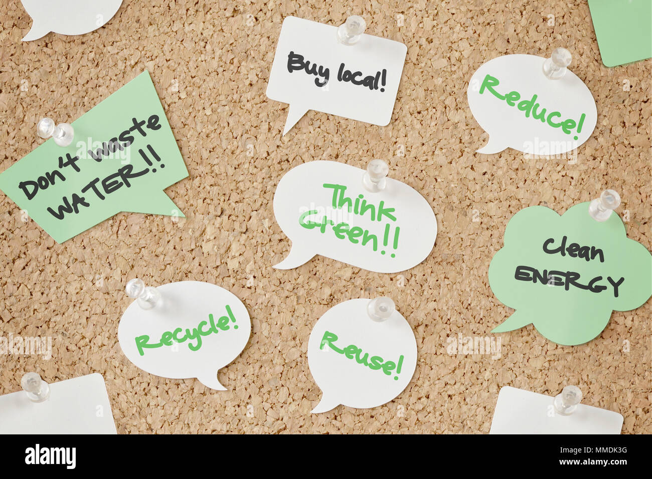 Speech bubbles with eco concept on pinboard Stock Photo - Alamy