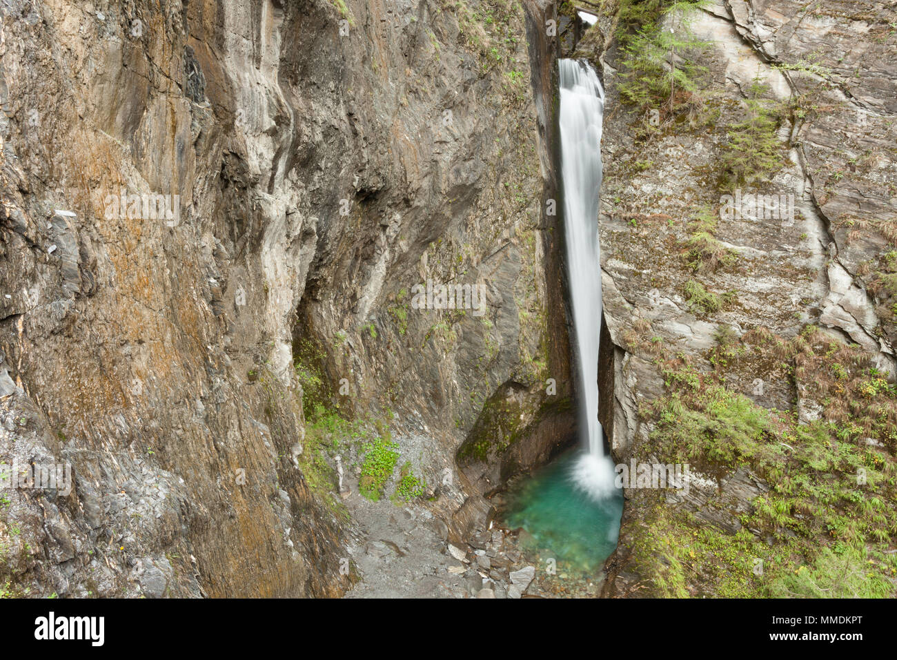 small waterfall and lake among the rock Stock Photo - Alamy