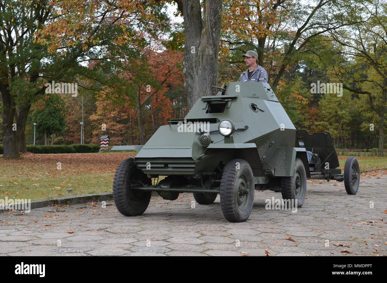 ZAGAN, Poland — A Polish BA-64 with an attached 45 mm anti-tank gun model 1937 arrives at a display of Army equipment for the Museum of Prisoner of War Camps, Zagan, Poland, Oct. 21. The museum event seeks to educate visitors about the Stalag Luft III Prisoner Camp, World War II, and Polish-American relations. The museum invites 1st Infantry Division Soldiers and members of the Historical Association Big Red One Poland to participate in educating the public. The 2nd Armored Brigade Combat Team, 1st Infantry Division, is currently in Europe to support Atlantic Resolve. Atlantic Resolve is a U.S Stock Photo