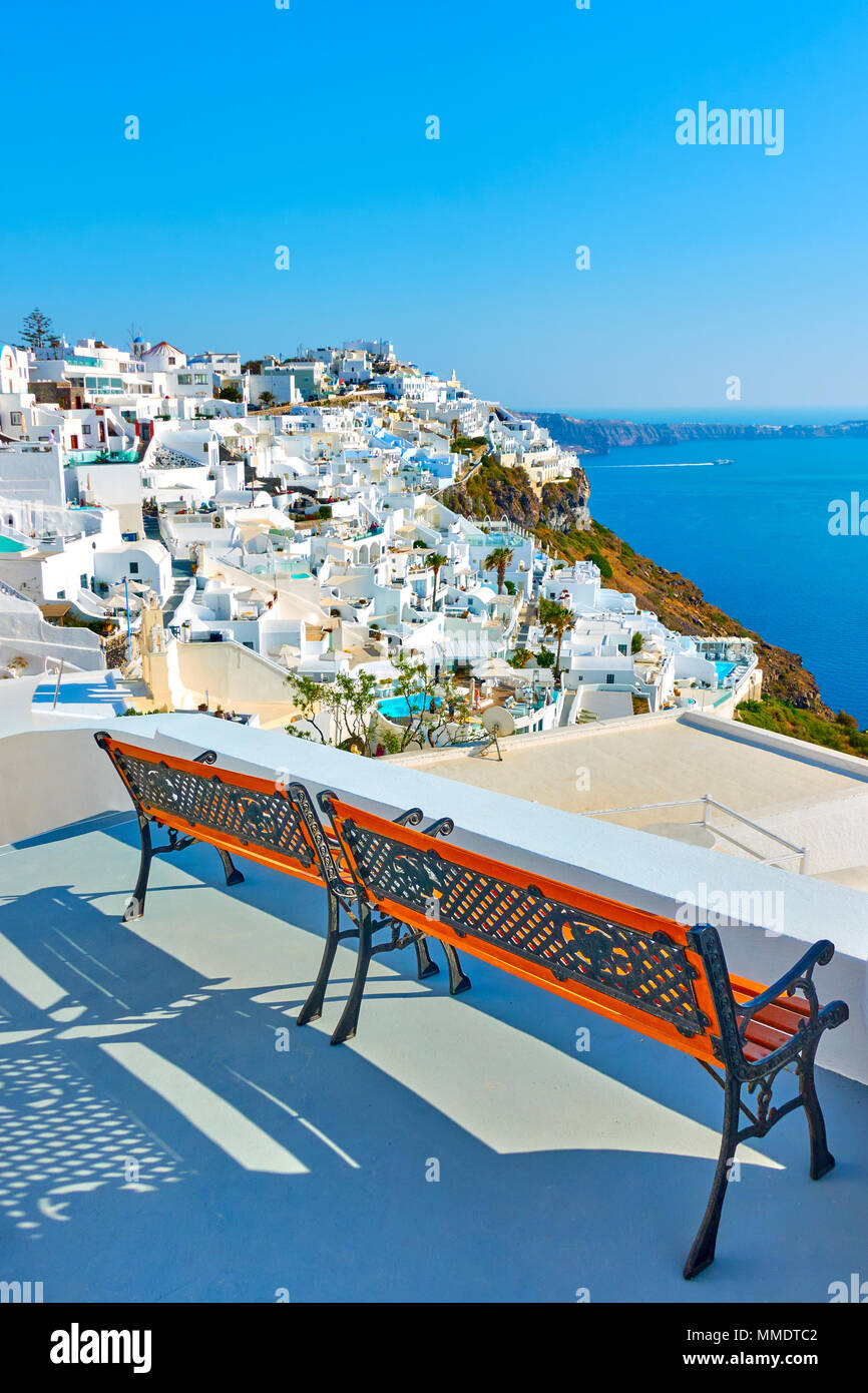 Two vacante benches at view point in Thira in Santorini, Greece Stock Photo