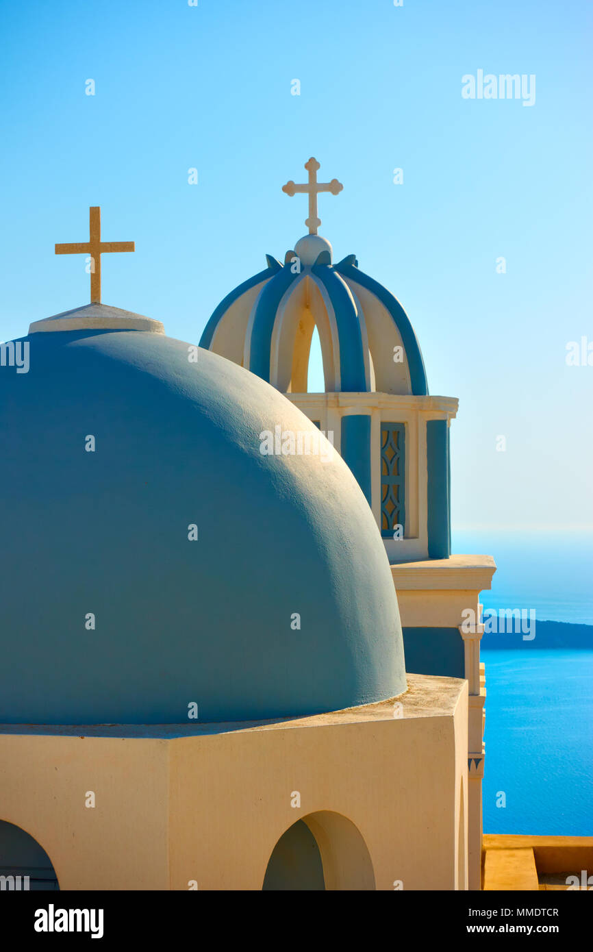 Domes with crosses of a Greek orthodox church in Thira town in Santorini Island, Greece Stock Photo