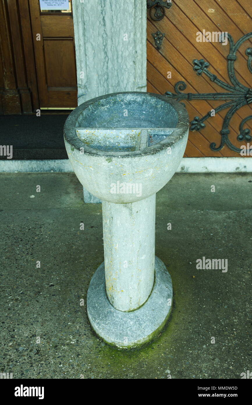 Font outside Peter and Paul Church in Kilmallock Stock Photo
