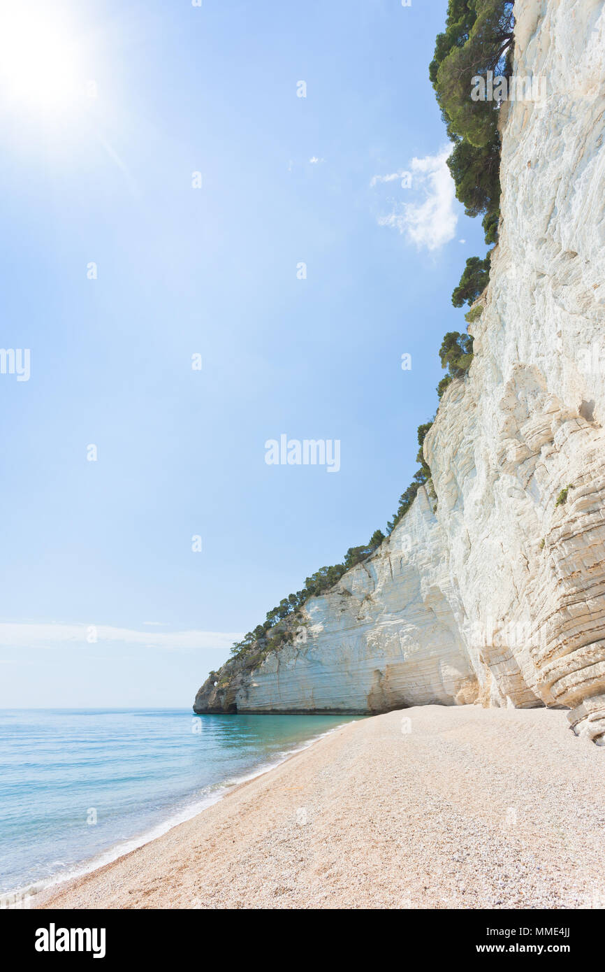 Vignanotica, Apulia, Italy - High noon at the gravel beach of Vignanotica Stock Photo