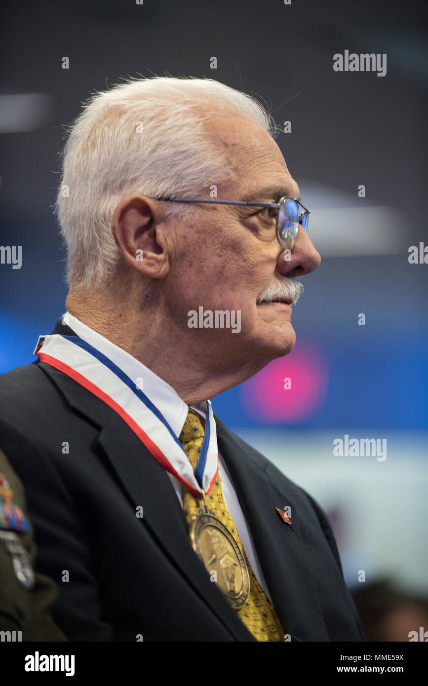 Mr. Richard Stone, accepting on behalf of the Special Forces Home for Christmas Fund - the U.S. Marine Corps awardee, views other awardees during the 2017 Spirit of Hope Awards at the Hall of Heroes in the Pentagon, Oct. 26, 2017. The Spirit of Hope Award is awarded to men and women of the U.S. Armed Forces, entertainers, and other distinguished Americans and organizations whose patriotism and service reflect that of Mr. Bob Hope. The recipients selflessly contributed an extraordinary amount of time, talent, or resources to significantly enhance the quality of life or service members and their Stock Photo