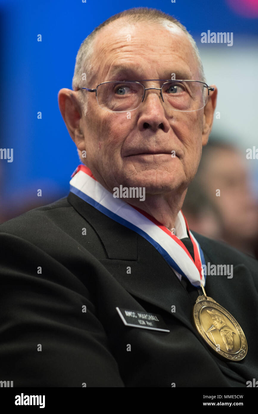 Retired U.S. Navy Chief Petty Officer Jim Marshall, the U.S. Navy awardee, views other awardees during the 2017 Spirit of Hope Awards at the Hall of Heroes in the Pentagon, Oct. 26, 2017. The Spirit of Hope Award is awarded to men and women of the U.S. Armed Forces, entertainers, and other distinguished Americans and organizations whose patriotism and service reflect that of Mr. Bob Hope. The recipients selflessly contributed an extraordinary amount of time, talent, or resources to significantly enhance the quality of life or service members and their families serving around the world. (DoD Ph Stock Photo