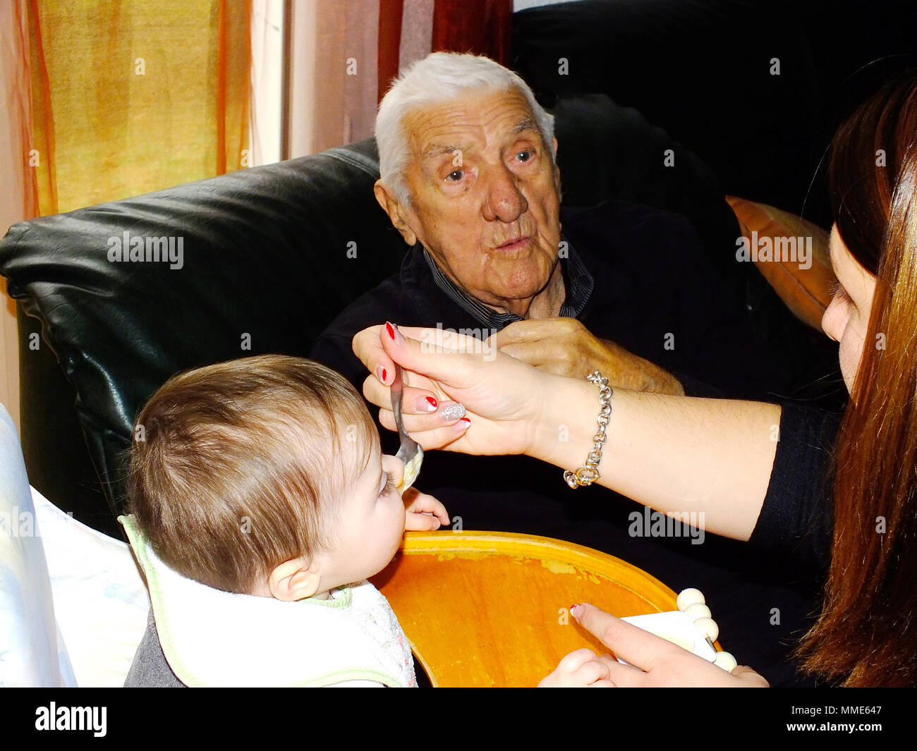 CENTENARIAN & BABY Stock Photo