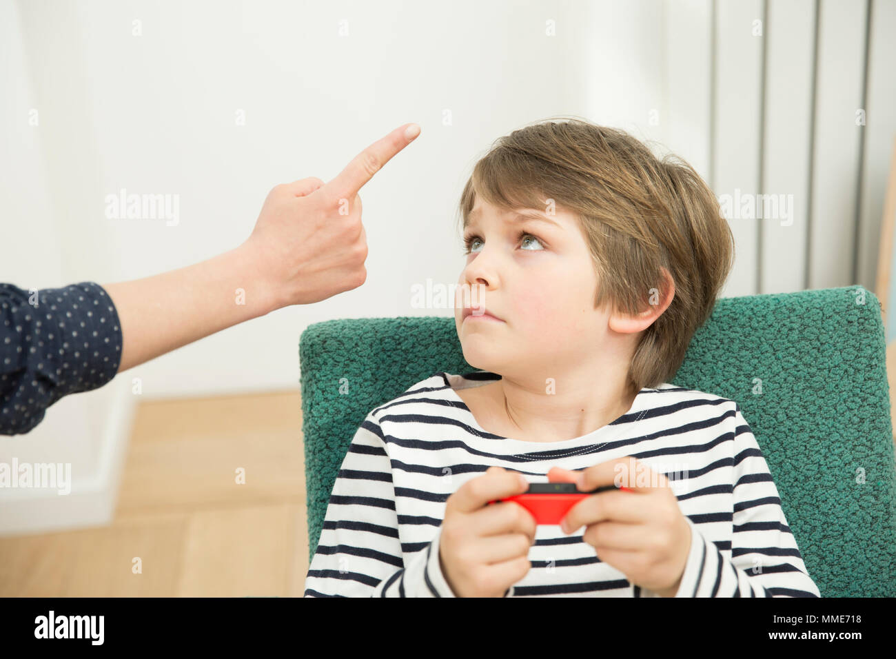 PARENT-CHILD CONFLICT Stock Photo