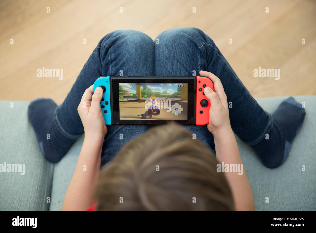 CHILD PLAYING VIDEO GAME Stock Photo Alamy