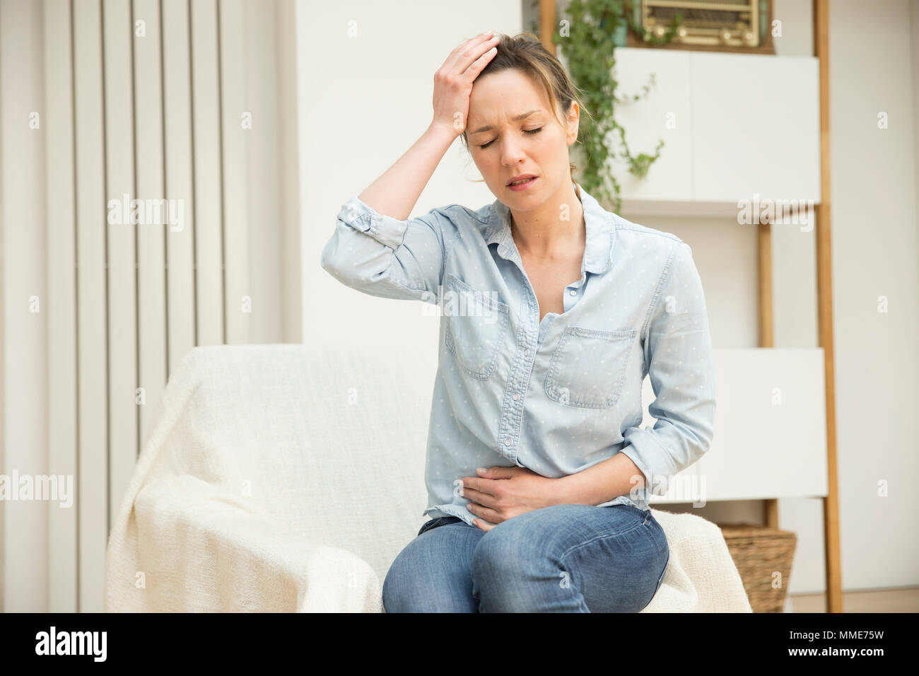 WOMAN WITH HEADACHE Stock Photo
