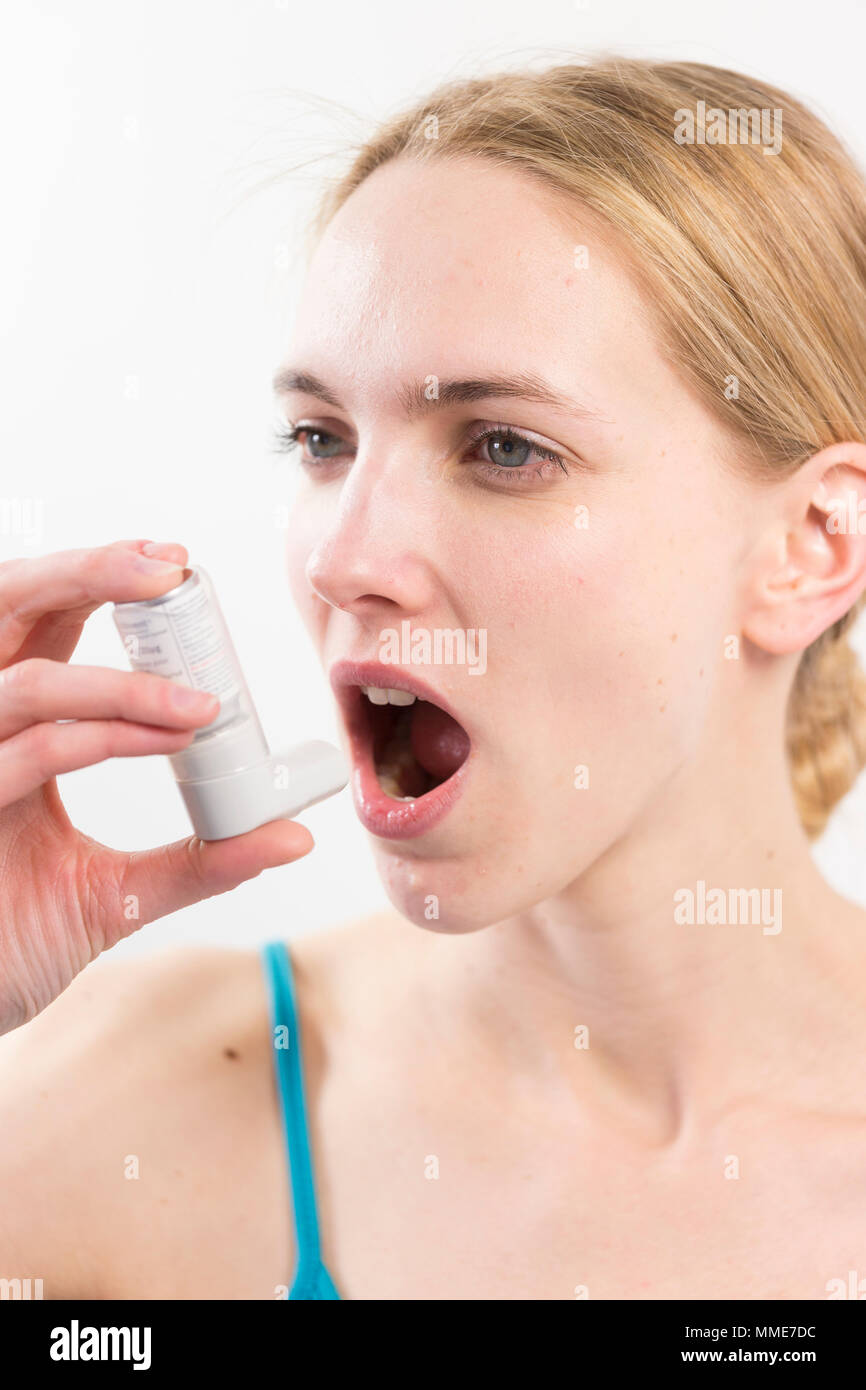 ASTHMA TREATMENT WOMAN Stock Photo