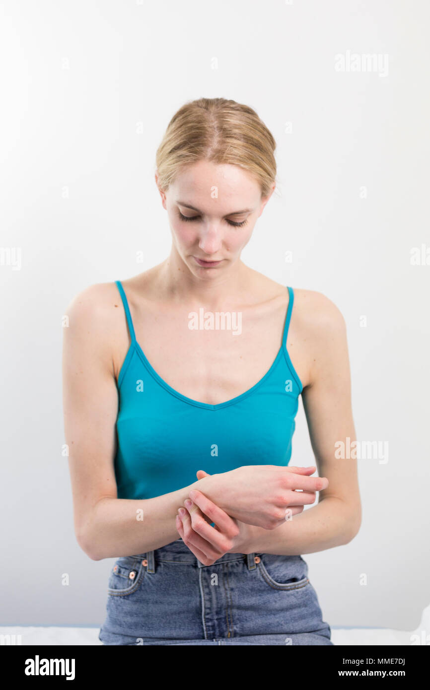 One woman wrists pain hi-res stock photography and images - Alamy