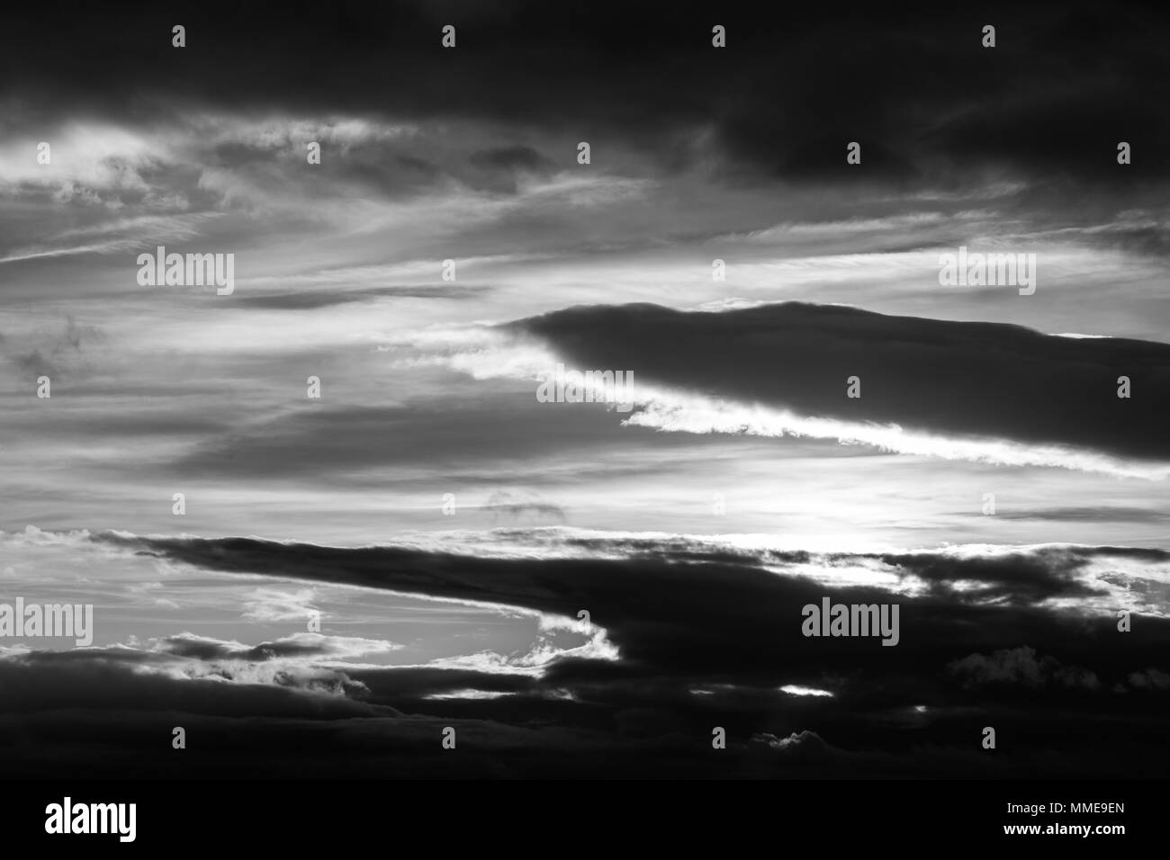 Cloudy dawn sky above Black and White Stock Photos & Images - Alamy