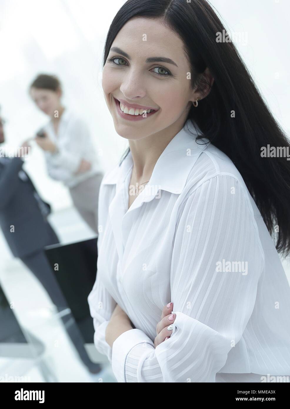 successful young business woman on the background of a workplace Stock ...