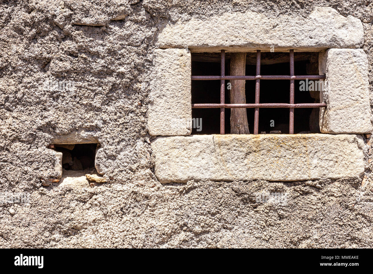 The broken window on stone wall, for background Stock Photo - Alamy