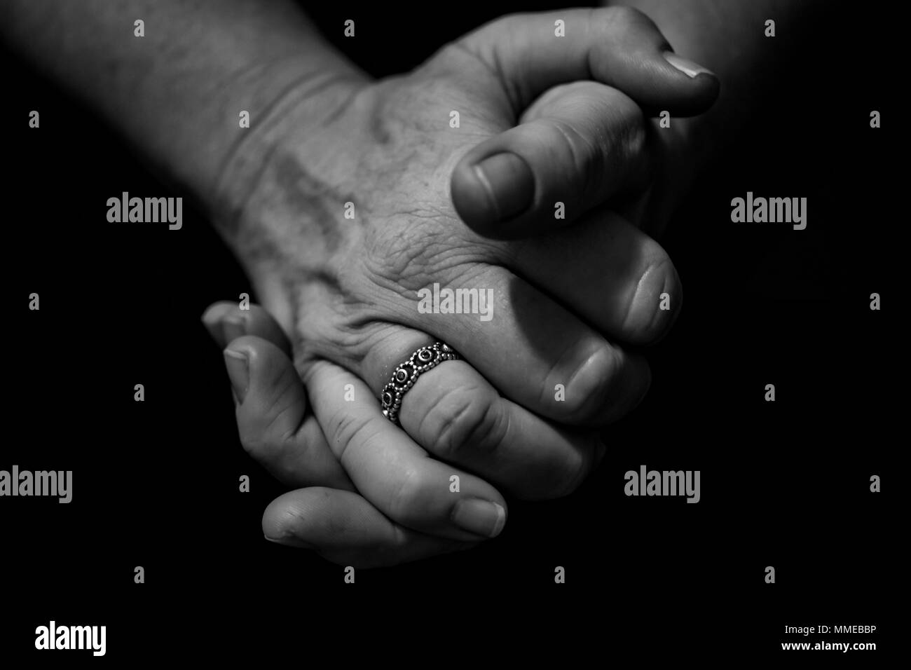 clasped hands, female Stock Photo