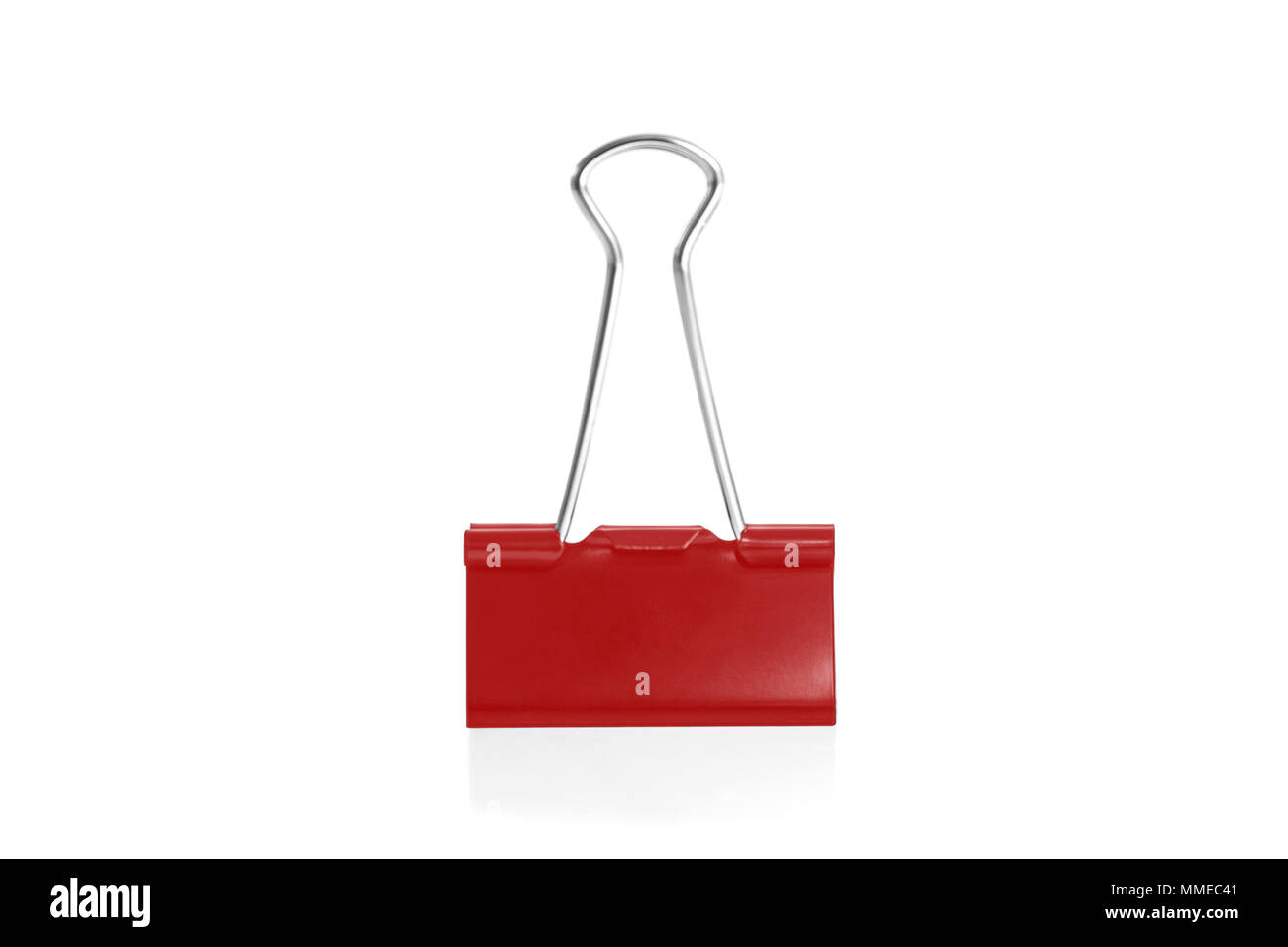 Paper clip isolated from white background. A paperclip is a device for