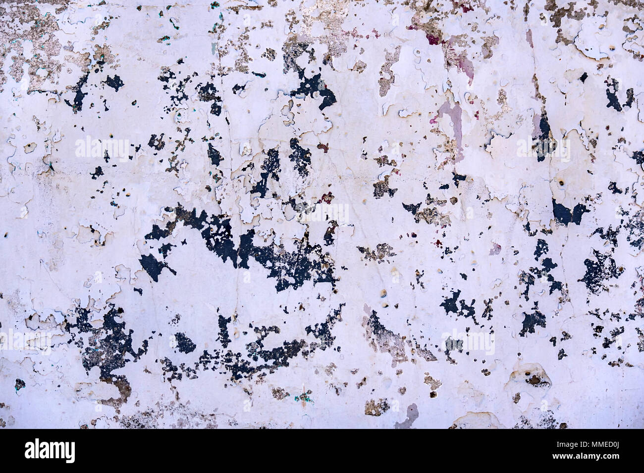 White obsolete cracked painted texture background close-up Stock Photo