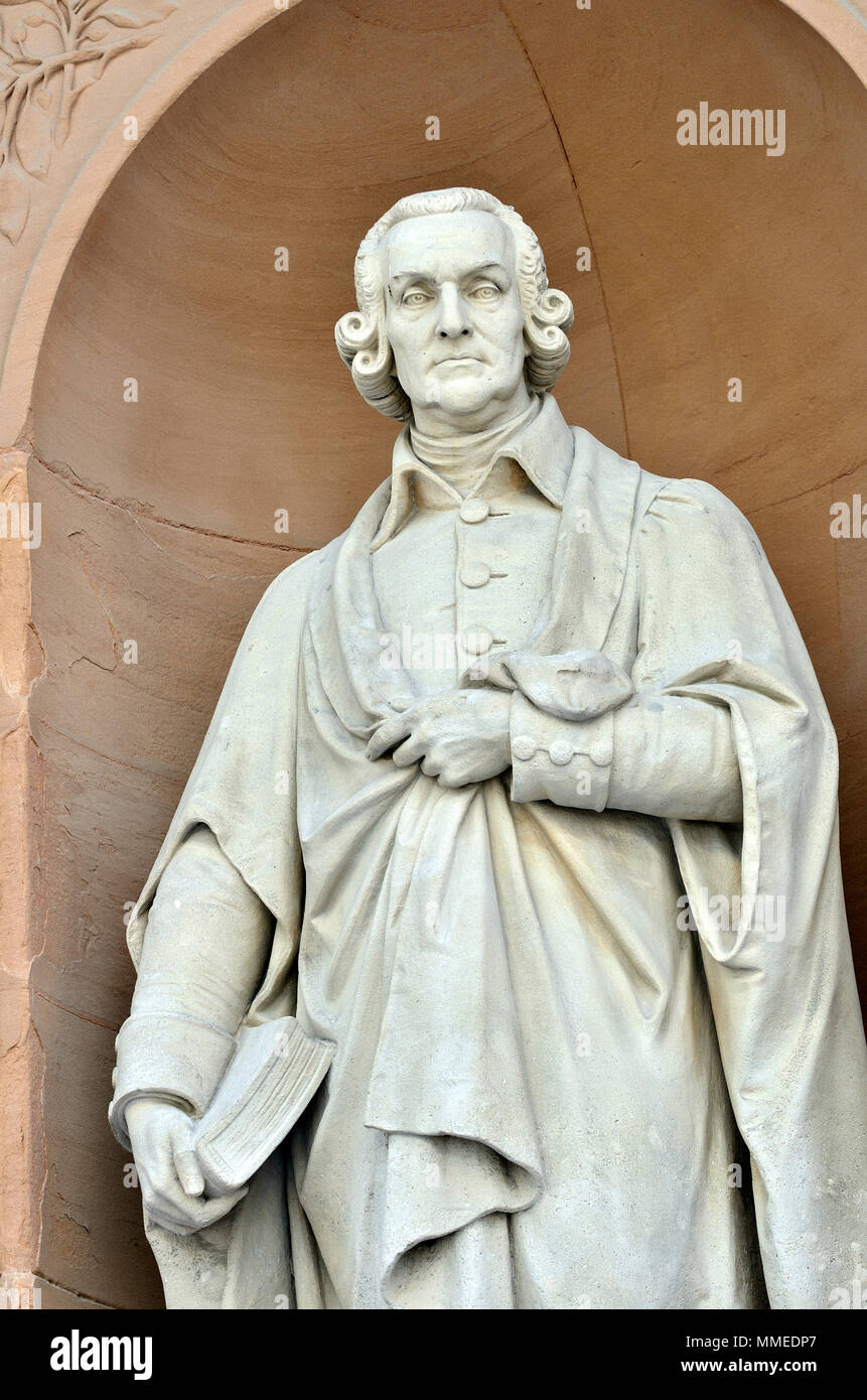 London, England, UK. Statue: Adam Smith (by William Theed) on Burlington Gardens facade of the Royal Academy (Burlington House) Cleaned and restored.. Stock Photo