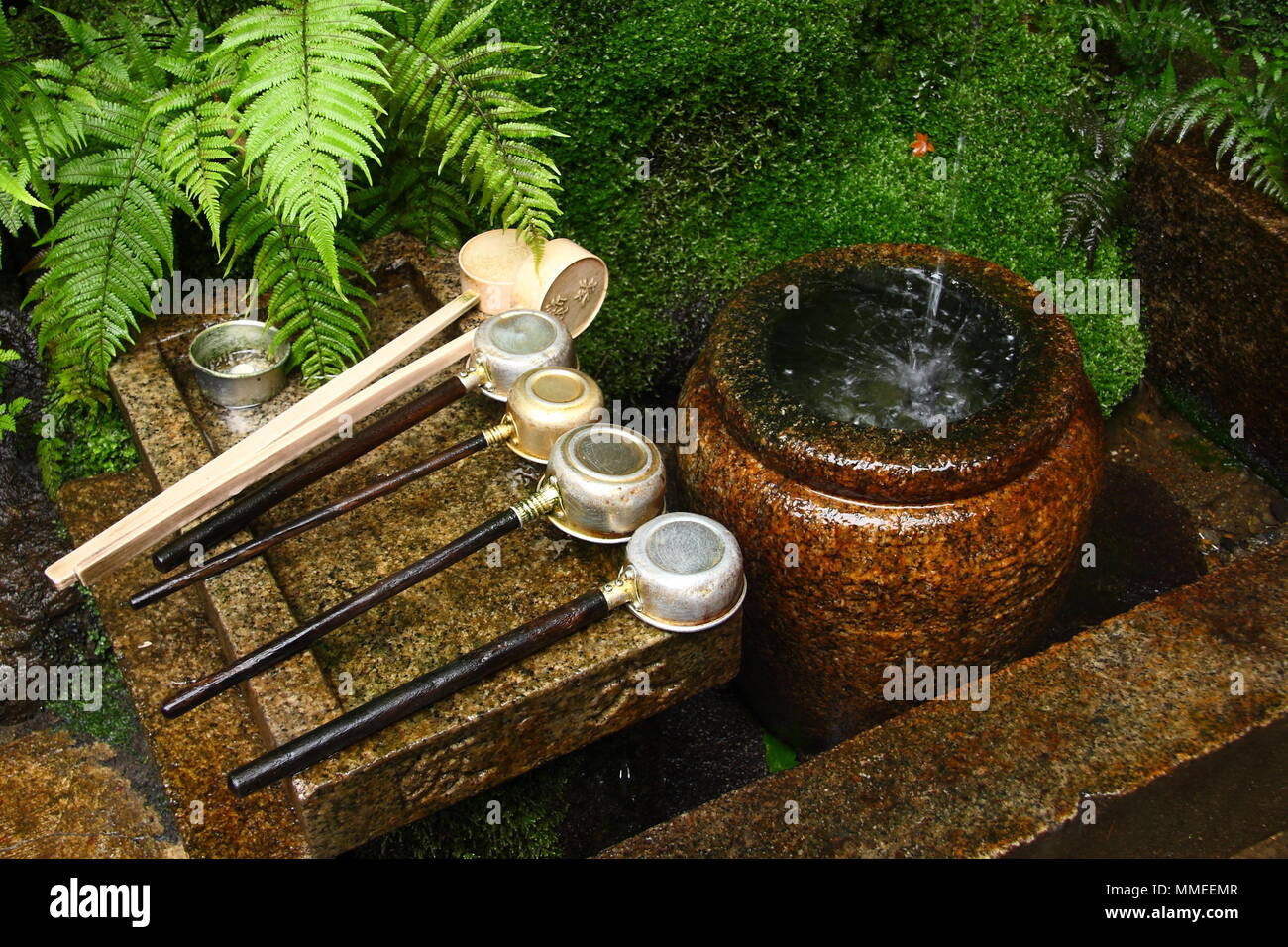 Water fountain for purification in Japan Stock Photo Alamy