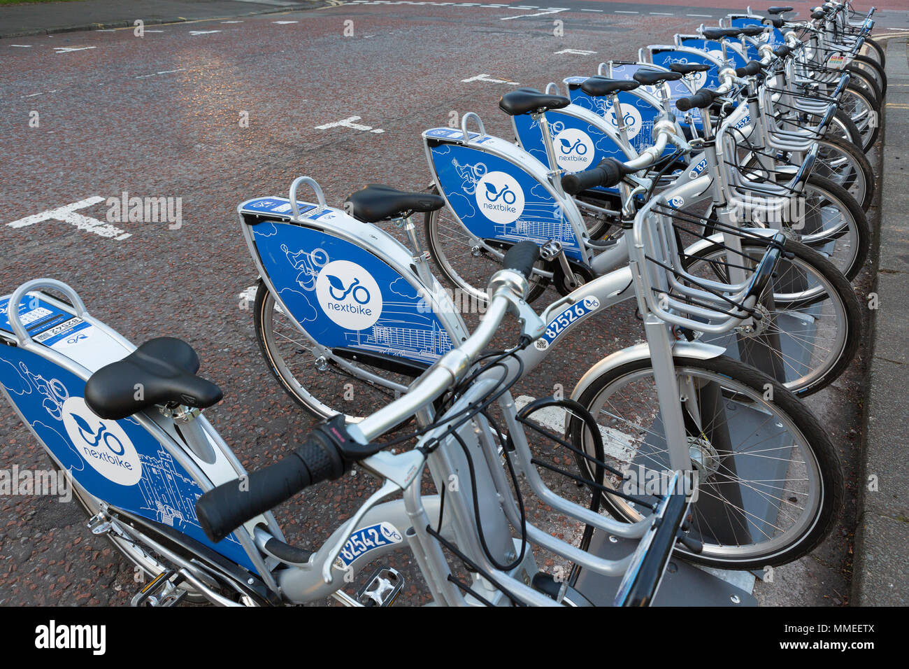Next Bikes for hire / rent lined up in Cardiff Stock Photo Alamy