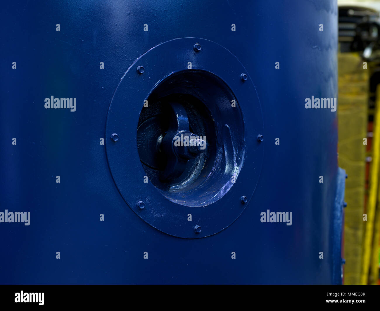 Removing and replacing the hand hole and gasket on a boiler Stock Photo