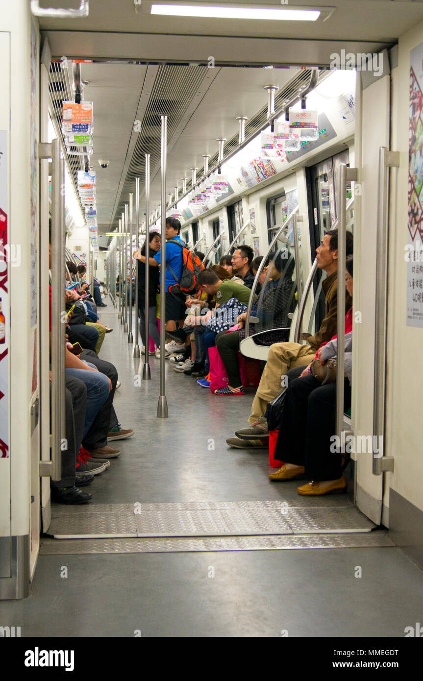 Interior of a metro train on the Beijing subway. Stock Photo