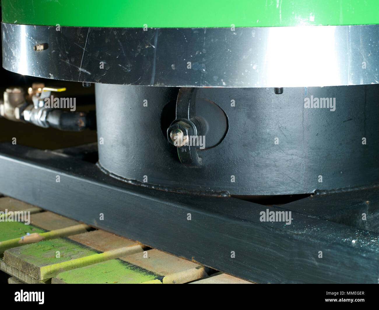 Removing and replacing the hand hole and gasket on a boiler Stock Photo