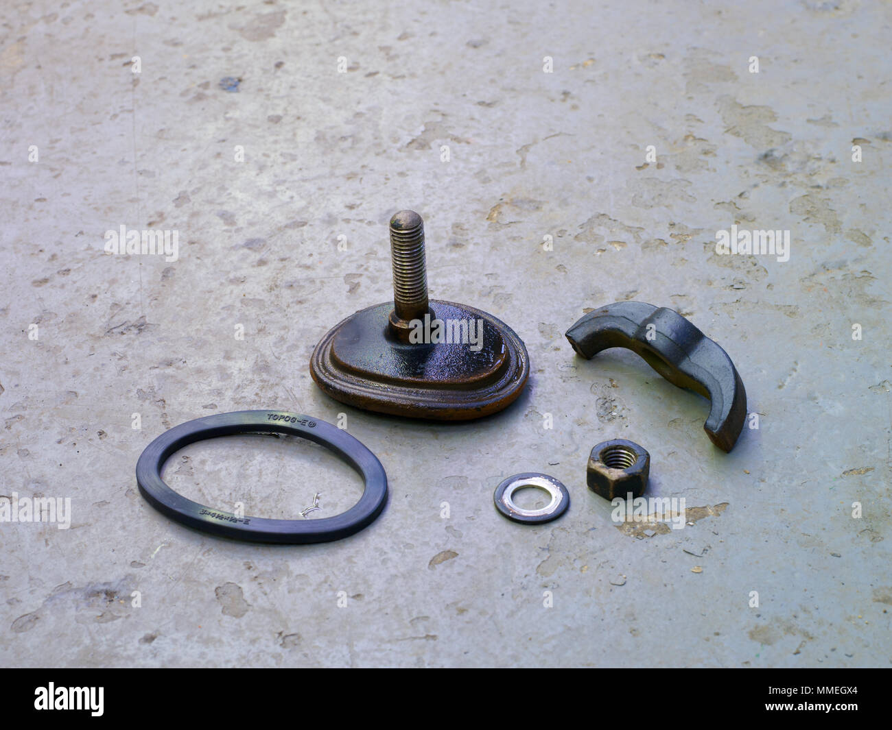 Removing and replacing the hand hole and gasket on a boiler Stock Photo