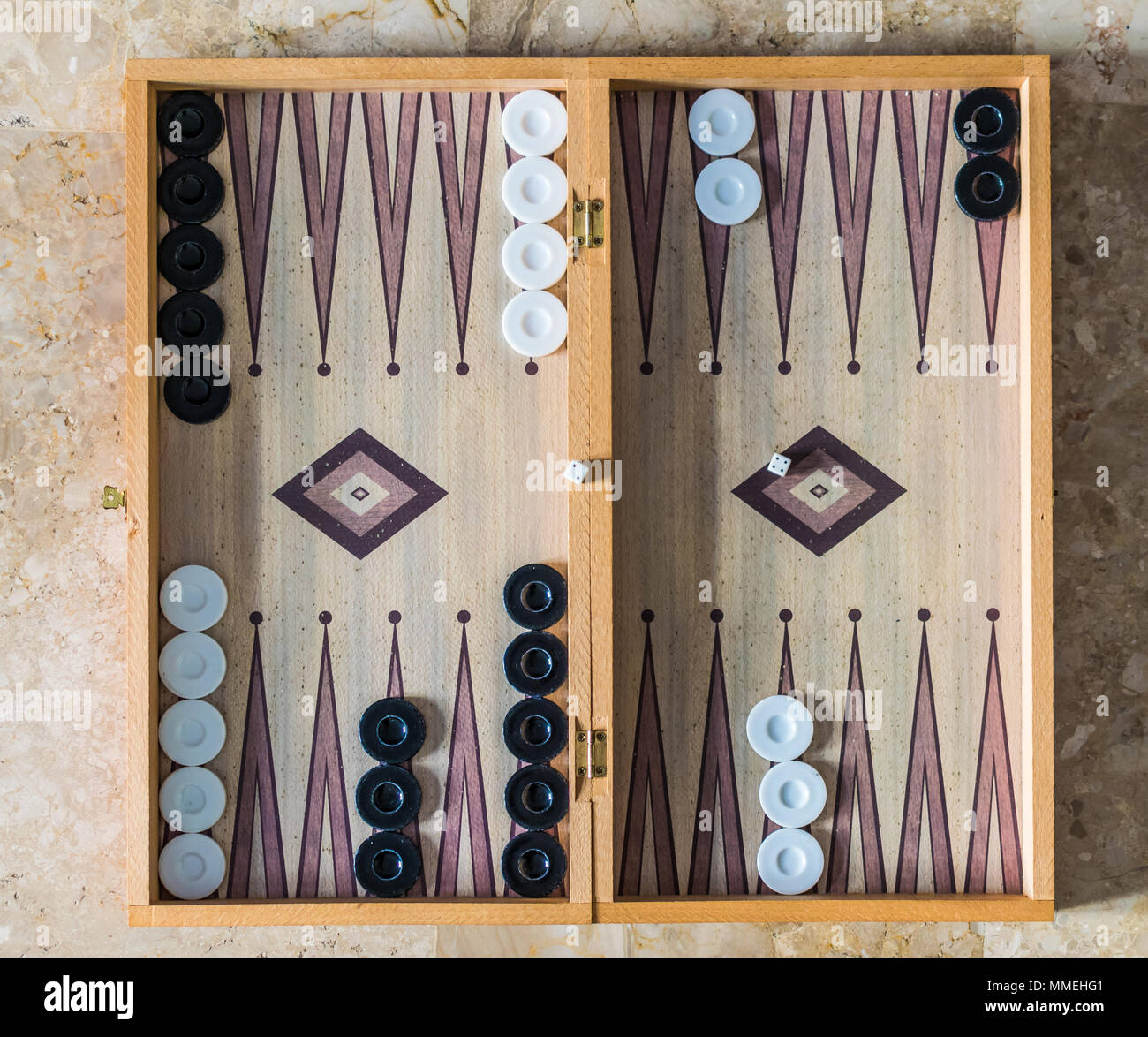 Close up of a backgammon board with dice Stock Photo