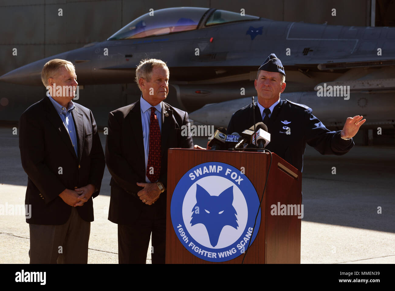 U.S. Air Force Chief of Staff Gen. David L. Goldfein, speaking, U.S. Senator Lindsey Graham, far left, and U.S. Representative Joe Wilson answer questions from the media in front of the main hangar of the South Carolina Air National Guard’s 169th Fighter Wing during a visit to McEntire Joint National Guard Base, S.C., Oct. 27, 2017. This was Goldfein’s first visit to McEntire JNGB as Chief of Staff to meet with Airmen and senior S.C. Air and Army National Guard leaders. (U.S. Air National Guard photo by Senior Master Sgt. Edward Snyder) Stock Photo