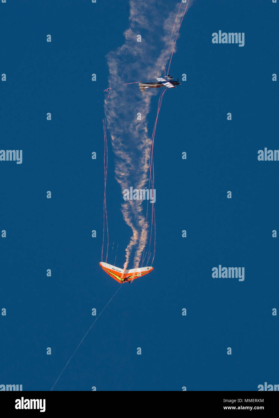 Brad Wursten in his MSXR cuts the streamers off of Dan Buchanan’s hang