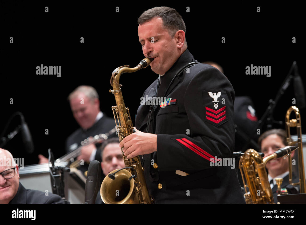 171027-N-NW255-2067 FORT WORTH, Texas (October 27, 2017) Musician 1st Class Manuel Pelayo de Gongora solos with the U.S. Navy Band Commodores jazz ensemble in a performance at Texas Christian University's Ed Landreth Auditorium. The band is on a 22-day national tour through six states, reaching audiences in parts of the country that might not see the Navy on a regular basis. (U.S. Navy photo by Senior Chief Musician Melissa Bishop/Released) Stock Photo