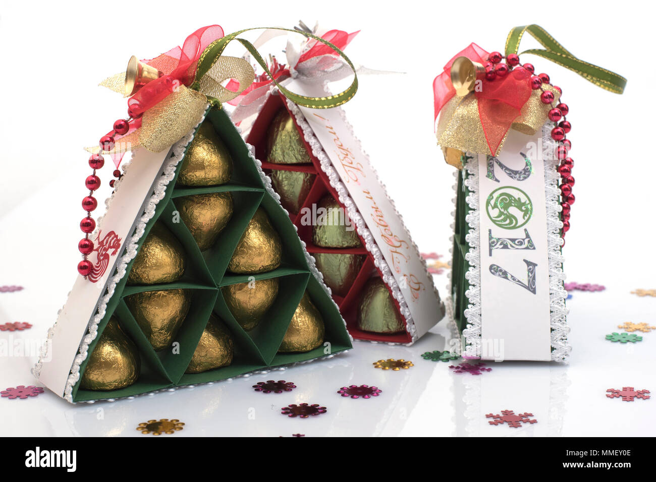 fir-trees handwork from paper with candies Stock Photo