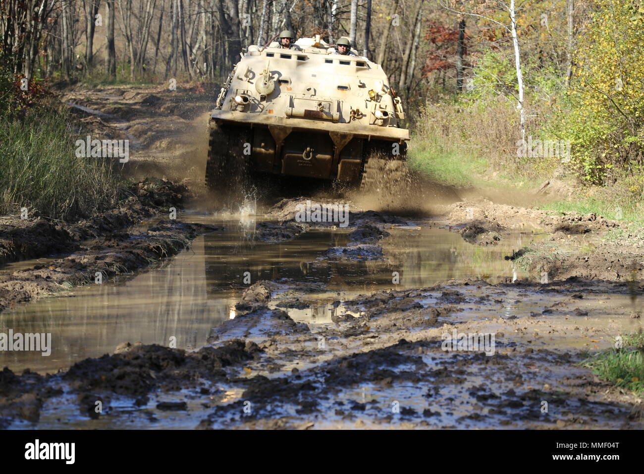 M88A1 Medium-Tracked Recovery Vehicle is an armored recovery vehicle developed for the United States Army to tow and repair disabled tracked vehicles, powered by a Continental AVDS-1790 diesel engine and equipped with a main winch rated at 60,000 pounds. On Oct. 20, 2017, it is driven during the Regional Training Site Maintenance Tracked-Vehicle Recovery Course at Fort McCoy, Wisconsin. The archival image documents hands-on vehicle recovery training on North Post. Stock Photo