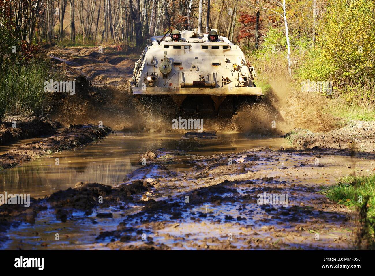 M88A1 Medium-Tracked Recovery Vehicle is an armored recovery vehicle developed for the United States Army to tow and repair disabled tracked vehicles, powered by a Continental AVDS-1790 diesel engine and equipped with a main winch rated at 60,000 pounds. On Oct. 20, 2017, it is driven during the Regional Training Site Maintenance Tracked-Vehicle Recovery Course at Fort McCoy, Wisconsin. The archival image documents hands-on vehicle recovery training on North Post. Stock Photo