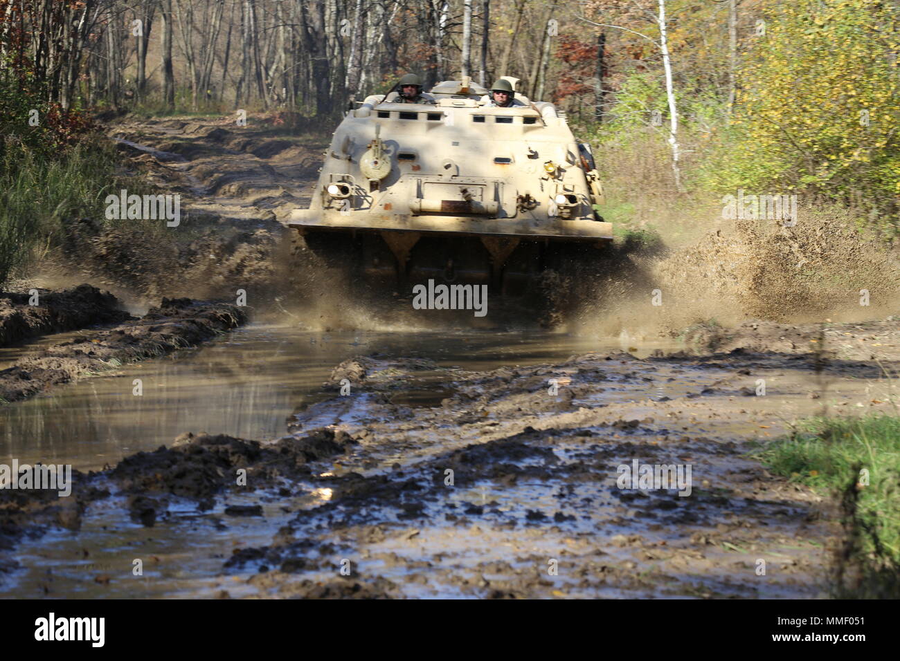M88A1 Medium-Tracked Recovery Vehicle is an armored recovery vehicle developed for the United States Army to tow and repair disabled tracked vehicles, powered by a Continental AVDS-1790 diesel engine and equipped with a main winch rated at 60,000 pounds. On Oct. 20, 2017, it is driven during the Regional Training Site Maintenance Tracked-Vehicle Recovery Course at Fort McCoy, Wisconsin. The archival image documents hands-on vehicle recovery training on North Post. Stock Photo